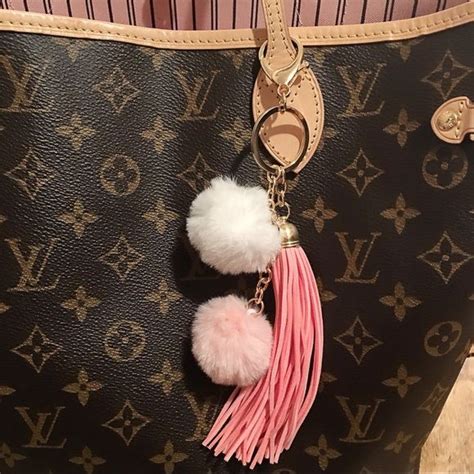 louis vuitton pom pom keychain replica|Louis Vuitton key pouch dupe.